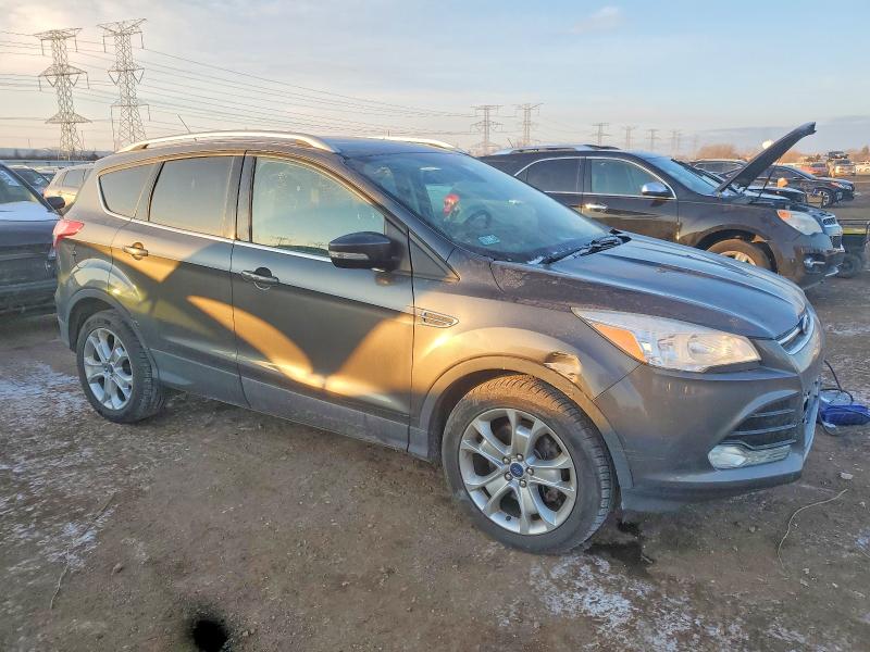 Photo 4 from auction – 2015 FORD ESCAPE TIT with VIN 1FMCU9J9XFUB54442