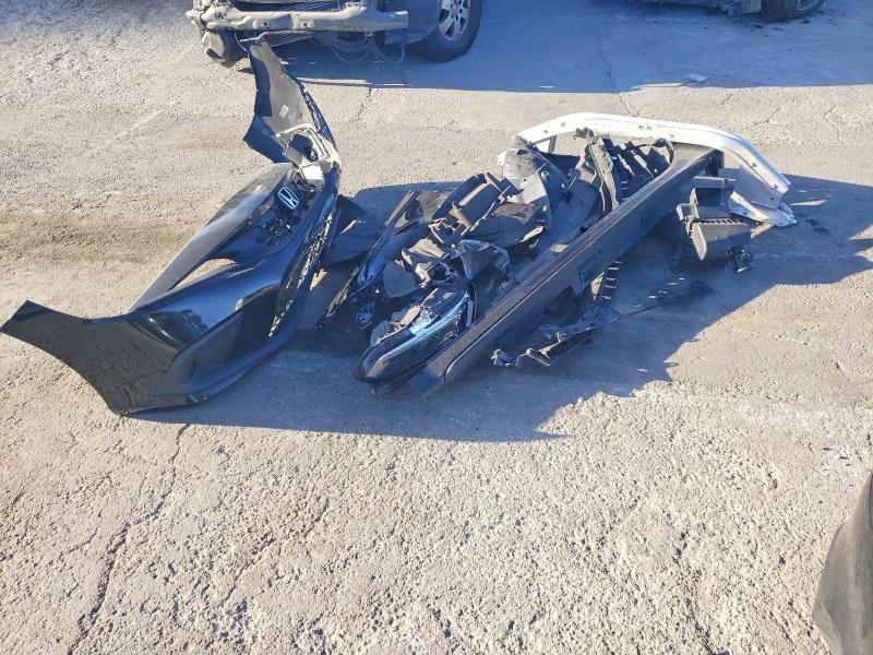 Photo 12 from auction – 2023 HONDA CIVIC with VIN 19XFL2H80PE003053