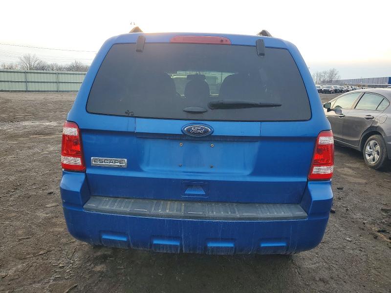 Photo 6 from auction – 2011 FORD ESCAPE with VIN 1FMCU0D73BKB90100
