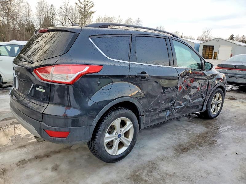 Photo 3 from auction – 2015 FORD ESCAPE with VIN 1FMCU0GX6FUC48240
