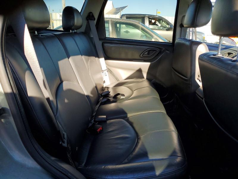 Photo 11 from auction – 2003 MAZDA TRIBUTE with VIN 4F2CZ96103KM06120