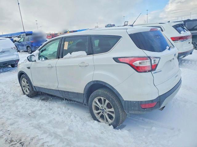 Photo 2 from auction – 2017 FORD ESCAPE SE with VIN 1FMCU9GD1HUB45692