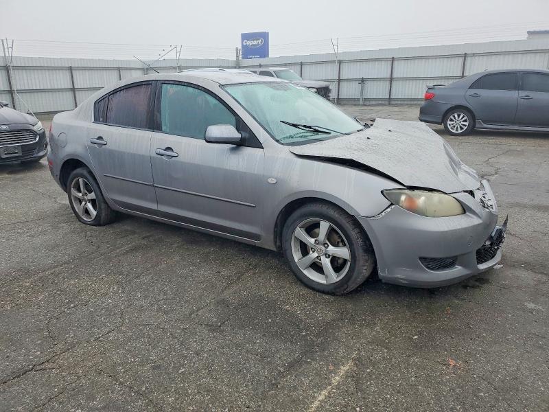 Photo 4 from auction – 2006 MAZDA 3 with VIN JM1BK32G161459605