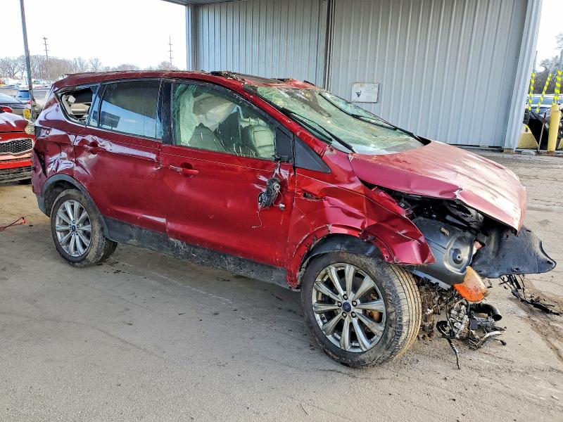 Photo 4 from auction – 2017 FORD ESCAPE TIT with VIN 1FMCU9J98HUB51090