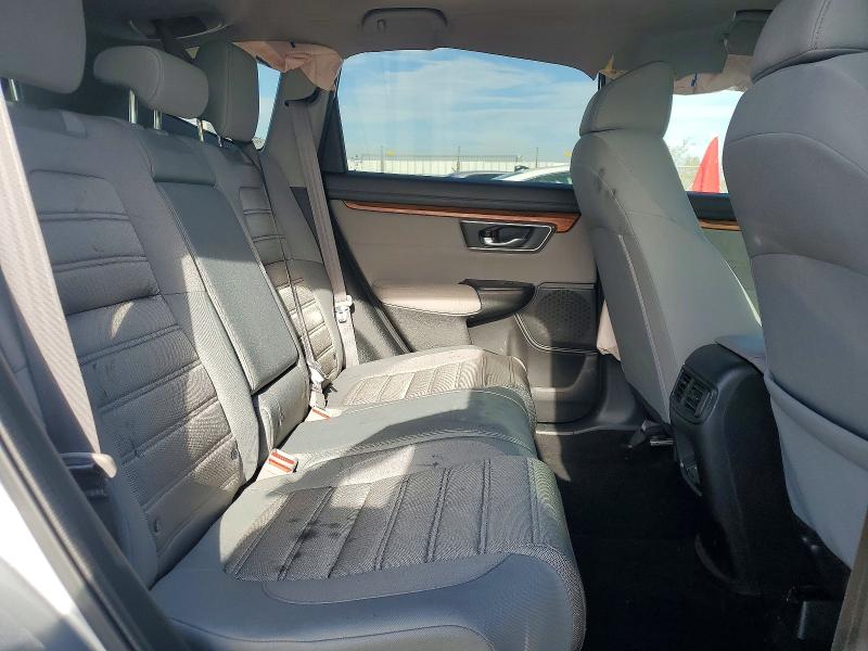 Photo 11 from auction – 2018 HONDA CR-V with VIN 7FARW2H50JE024159