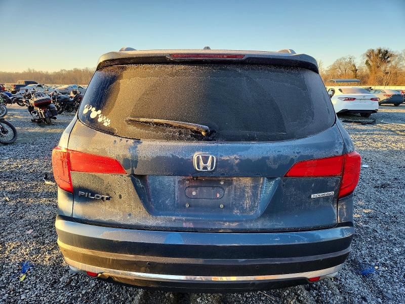 Photo 6 from auction – 2017 HONDA PILOT TOUR with VIN 5FNYF5H98HB032189