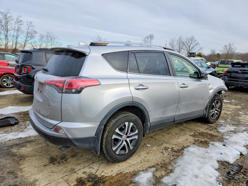 Photo 3 from auction – 2018 TOYOTA RAV4 LE with VIN JTMBFREV2JJ196678