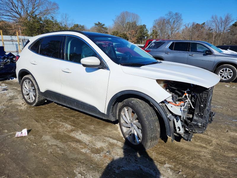 Photo 4 from auction – 2021 FORD ESCAPE TIT with VIN 1FMCU9DZ5MUA24352