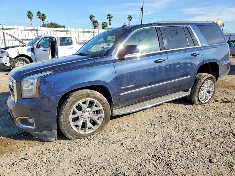 GMC YUKON 2018 with VIN 1GKS1BKC1JR322124 - Photo from auction