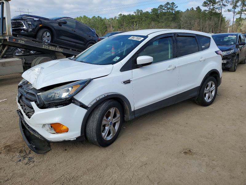 FORD ESCAPE 2018 with VIN 1FMCU0F70JUB03253 - Photo from auction
