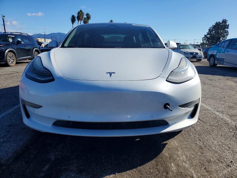 Photo 5 from auction – 2018 TESLA MODEL 3 with VIN 5YJ3E1EA1JF022999