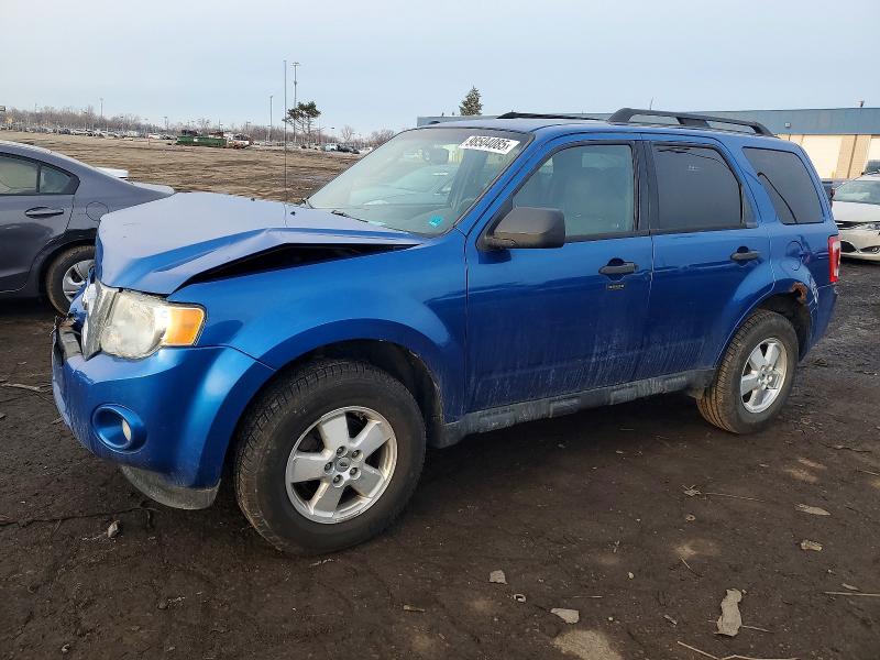 FORD ESCAPE 2011 with VIN 1FMCU0D73BKB90100 - Photo from auction