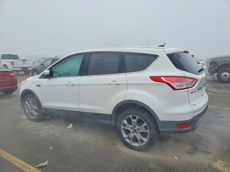 Photo 2 from auction – 2013 FORD ESCAPE SEL with VIN 1FMCU9H96DUD57833