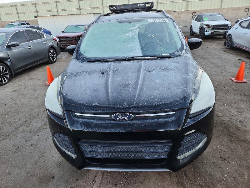 Photo 5 from auction – 2016 FORD ESCAPE SE with VIN 1FMCU9G92GUA98621