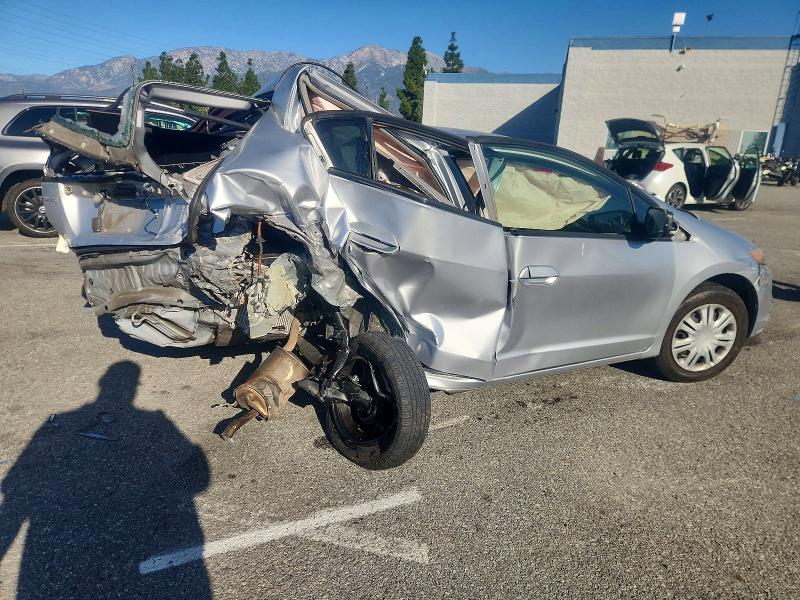 Photo 3 from auction – 2011 HONDA INSIGHT LX with VIN JHMZE2H57BS011491