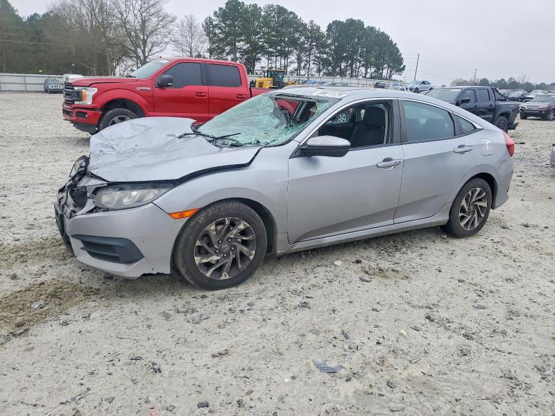 HONDA CIVIC EX 2018 with VIN 2HGFC2F7XJH549558 - Photo from auction