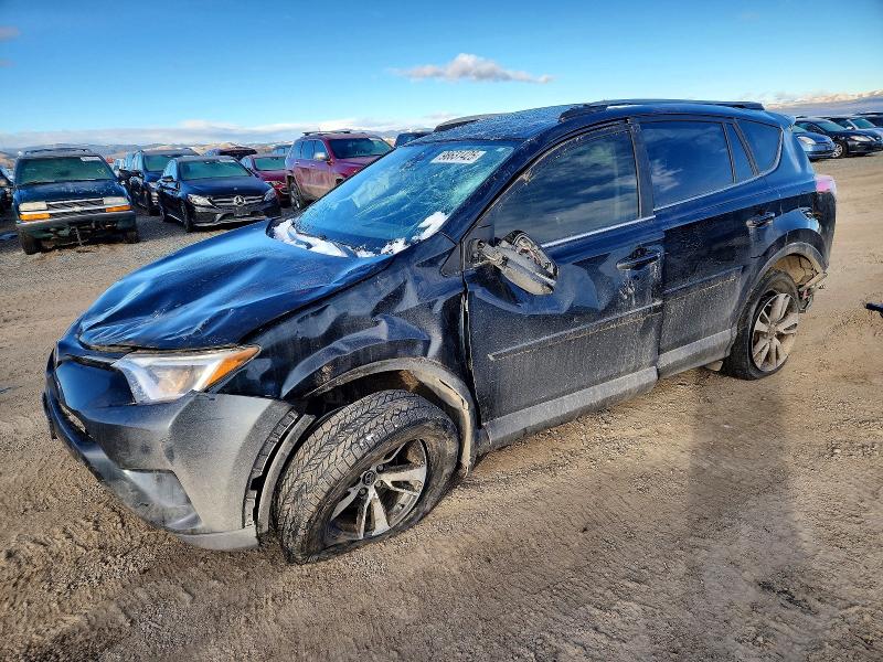 TOYOTA RAV4 XLE 2017 with VIN JTMRFREV8HJ706475 - Photo from auction