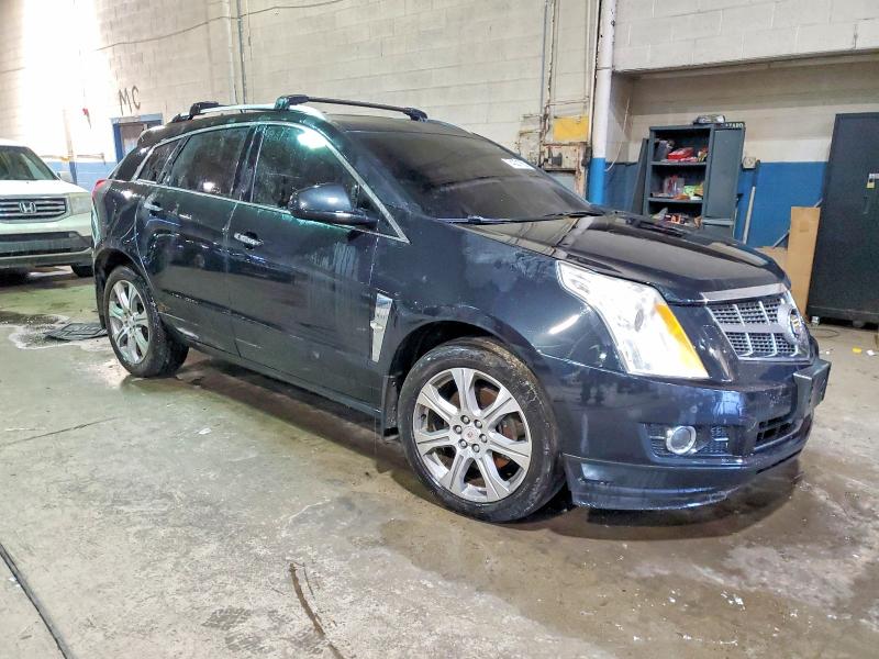 Photo 4 from auction – 2012 CADILLAC SRX PERFOR with VIN 3GYFNEE32CS500888