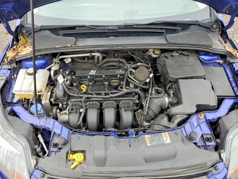 Photo 11 from auction – 2014 FORD FOCUS TITA with VIN 1FADP3N23EL462248