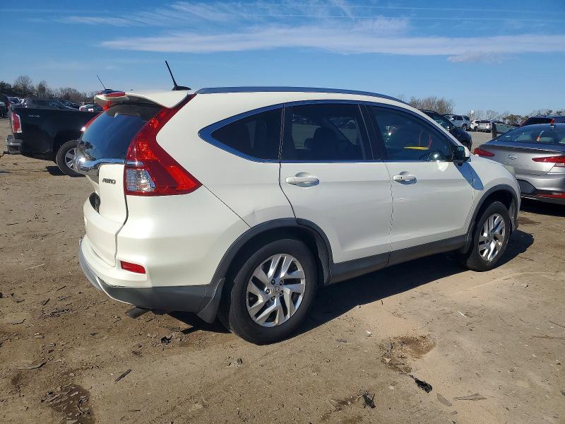 Photo 3 from auction – 2015 HONDA CR-V EXL with VIN 5J6RM4H74FL110734