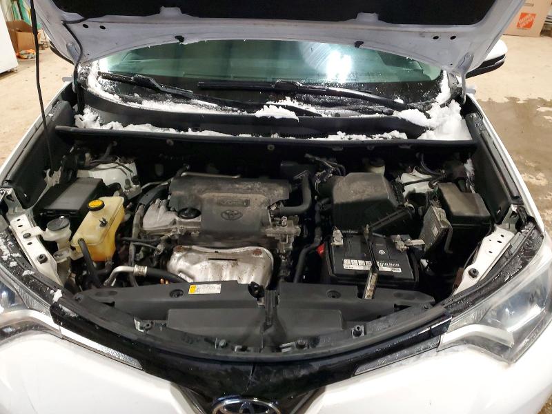 Photo 12 from auction – 2018 TOYOTA RAV4 LE with VIN 2T3ZFREV4JW481690