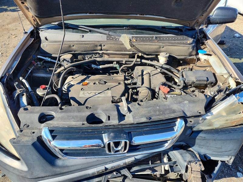 Photo 11 from auction – 2004 HONDA CR-V LX with VIN SHSRD78404U233582