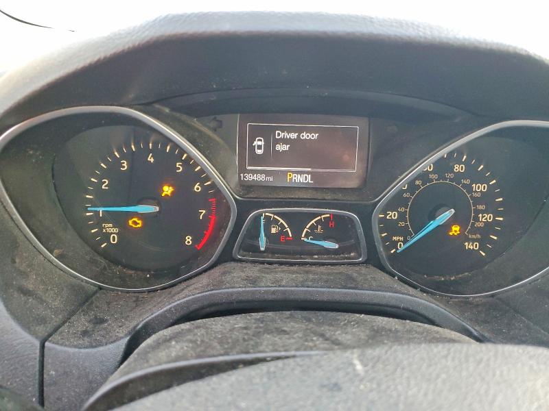 Photo 9 from auction – 2015 FORD FOCUS with VIN 1FADP3F24FL384336