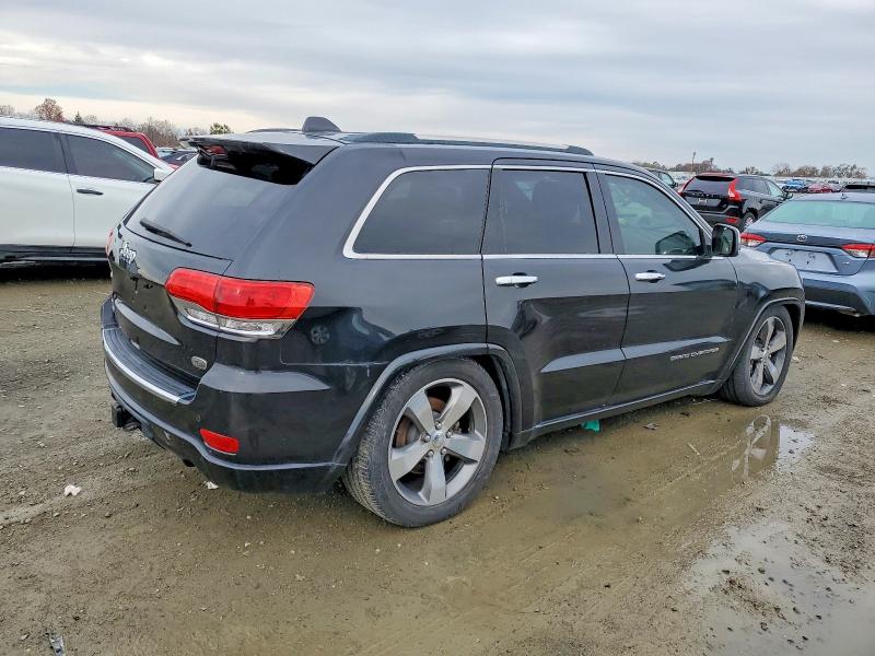 Photo 3 from auction – 2014 JEEP GRAND CHEROKEE with VIN 1C4RJFCM4EC521167
