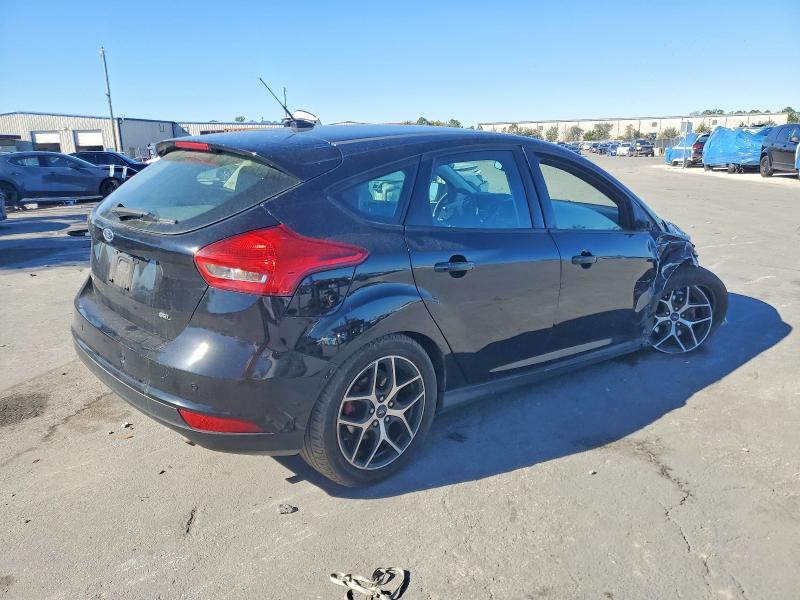 Photo 3 from auction – 2018 FORD FOCUS with VIN 1FADP3M26JL297825