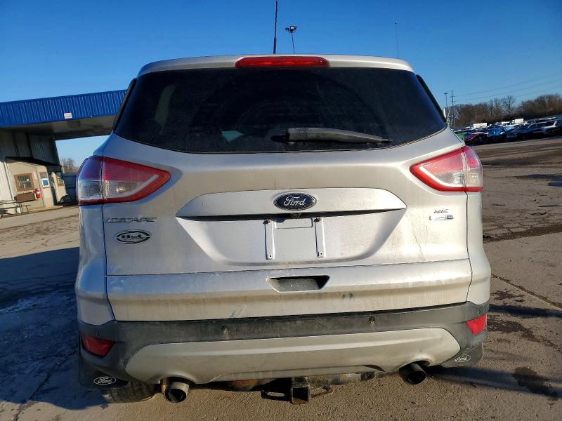 Photo 6 from auction – 2016 FORD ESCAPE SE with VIN 1FMCU9GX7GUA27638