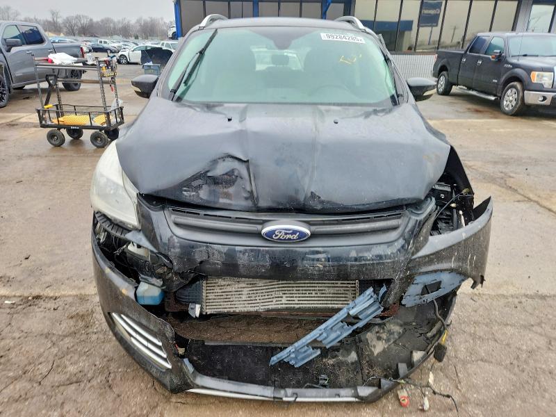 Photo 5 from auction – 2014 FORD ESCAPE with VIN 1FMCU9J95EUB28037