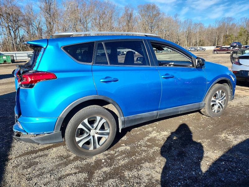 Photo 3 from auction – 2018 TOYOTA RAV4 with VIN JTMZFREV2JD115966