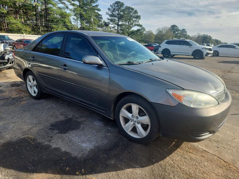 Photo 4 from auction – 2002 TOYOTA CAMRY LE with VIN JTDBE32K320069388