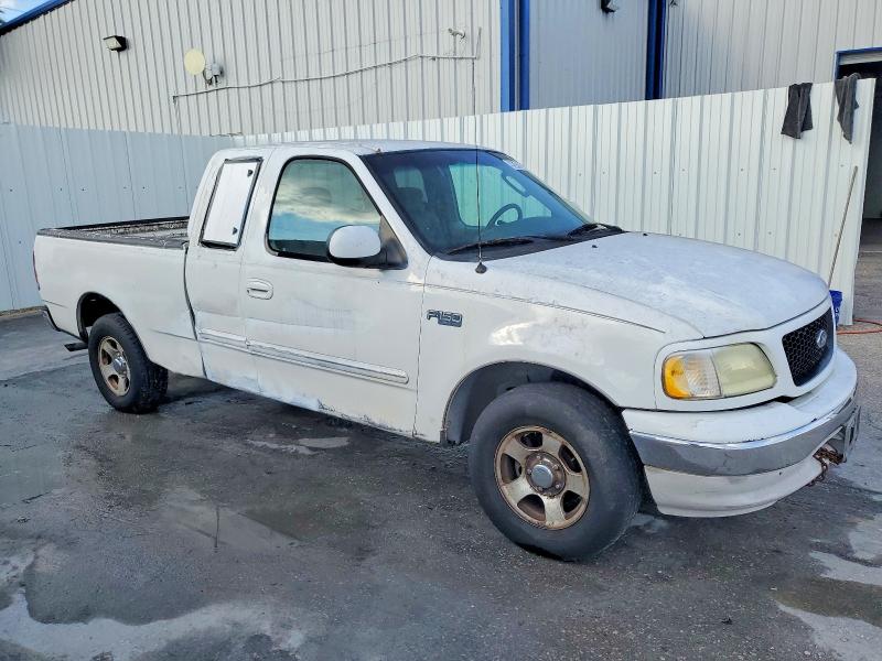 Photo 4 from auction – 2003 FORD F150 with VIN 1FTRX17253NA21417
