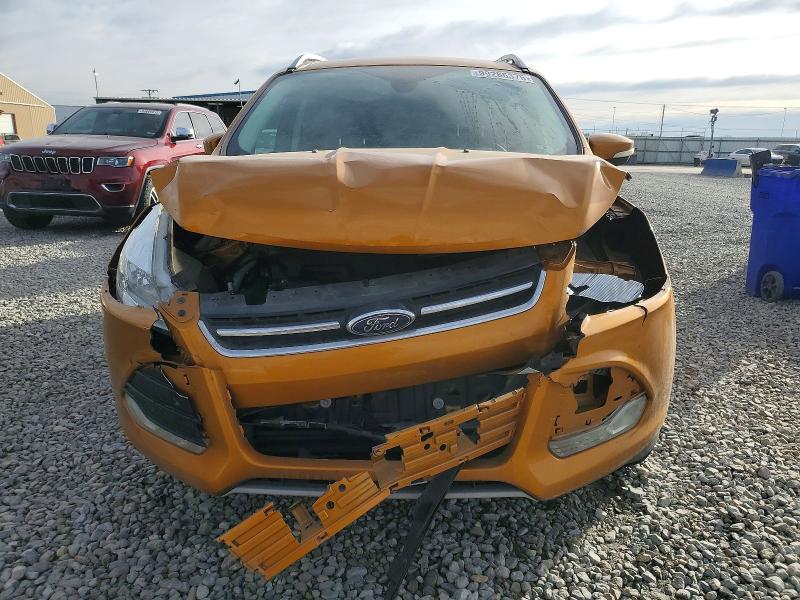 Photo 5 from auction – 2016 FORD ESCAPE with VIN 1FMCU9JX8GUB63494