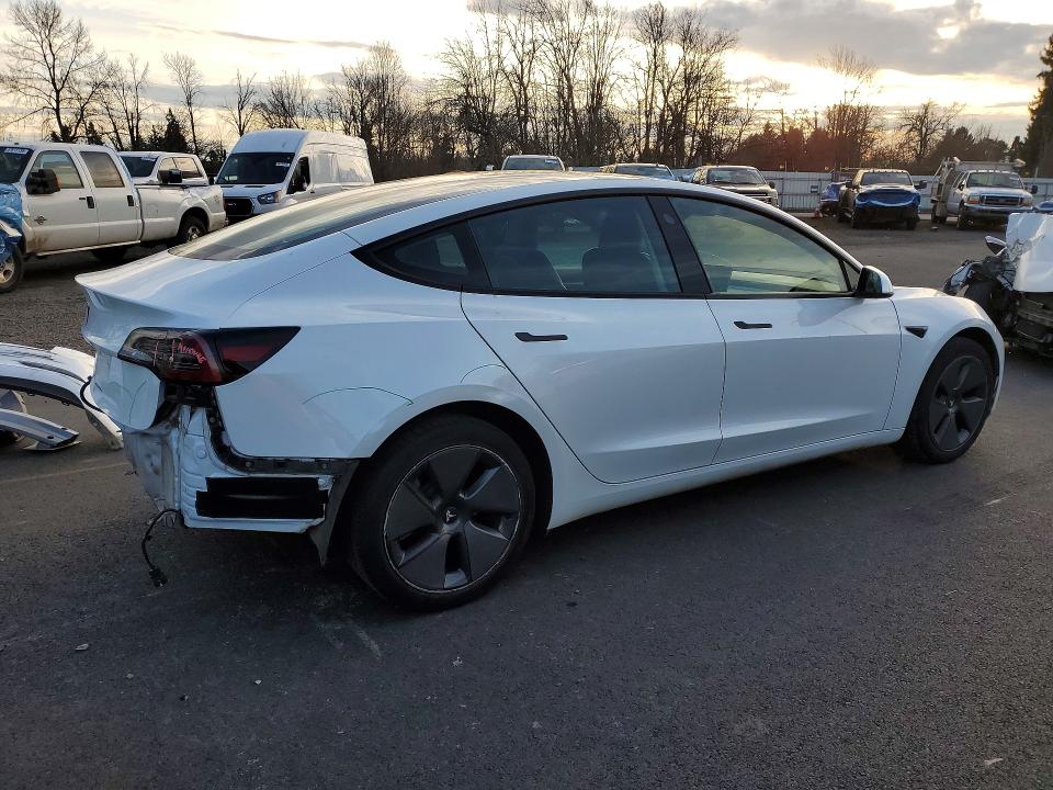 Photo 3 from auction – 2023 TESLA MODEL 3 with VIN 5YJ3E1EA3PF519030