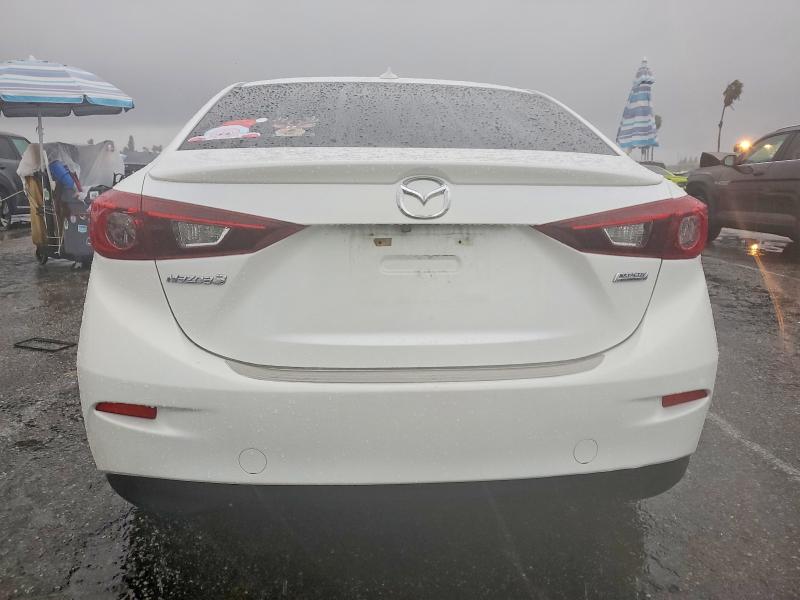Photo 6 from auction – 2015 MAZDA 3 with VIN JM1BM1V70F1252665