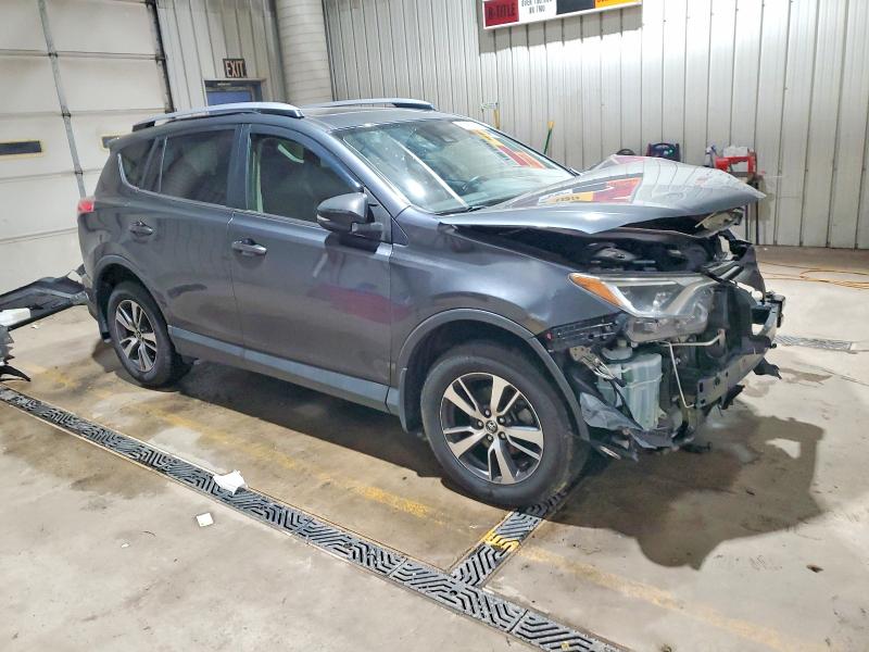 Photo 4 from auction – 2017 TOYOTA RAV4 XLE with VIN JTMRFREV5HD211567