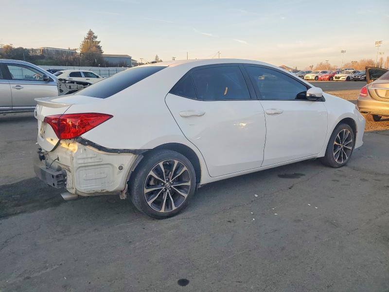 Photo 3 from auction – 2017 TOYOTA COROLLA with VIN 5YFBURHE7HP577188