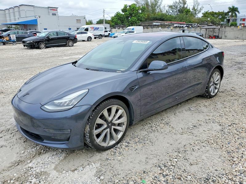 TESLA MODEL 3 2018 with VIN 5YJ3E1EB7JF076977 - Photo from auction