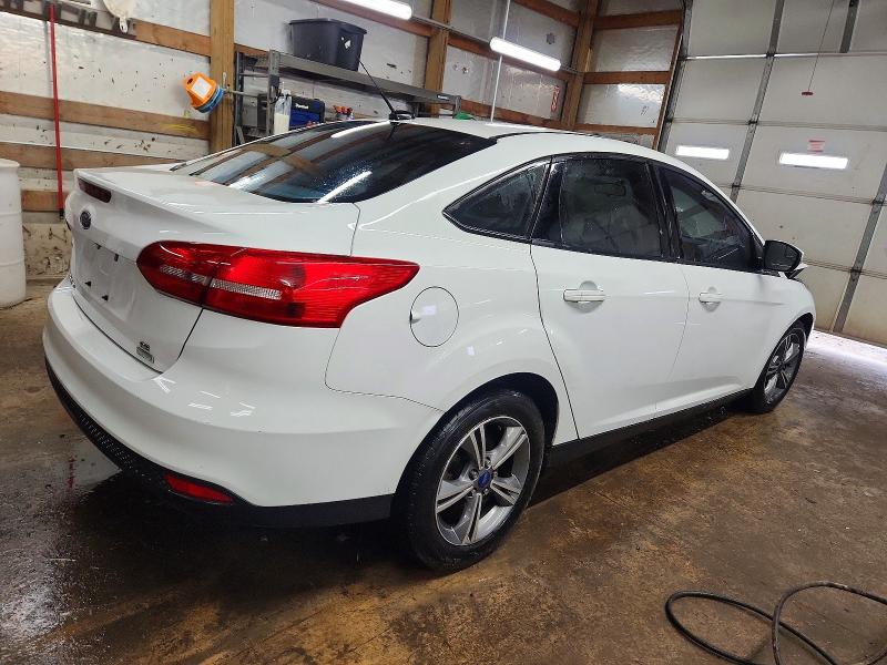 Photo 3 from auction – 2016 FORD FOCUS SE with VIN 1FADP3FE3GL403096