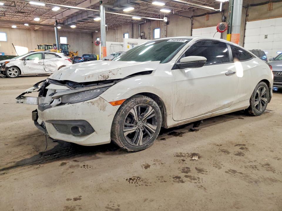 HONDA CIVIC 2017 with VIN 2HGFC3B9XHH353840 - Photo from auction