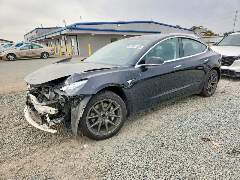 TESLA MODEL 3 2019 with VIN 5YJ3E1EA8KF395555 - Photo from auction