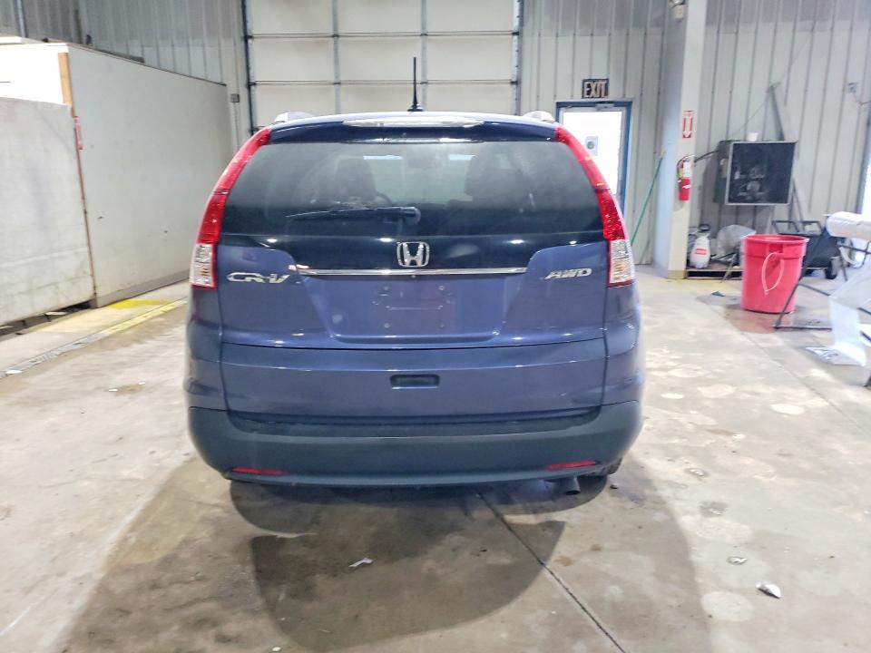 Photo 6 from auction – 2014 HONDA CR-V with VIN 2HKRM4H71EH657694