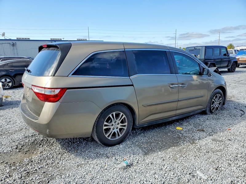 Photo 3 from auction – 2011 HONDA ODYSSEY with VIN 5FNRL5H66BB041354