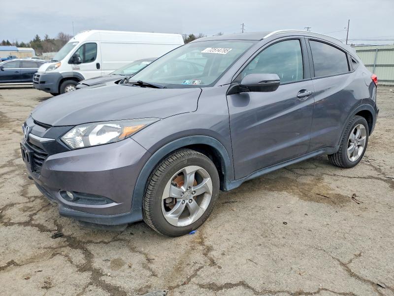 HONDA HR-V EXL 2017 with VIN 3CZRU6H79HM700098 - Photo from auction