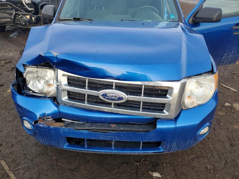 Photo 12 from auction – 2011 FORD ESCAPE with VIN 1FMCU0D73BKB90100