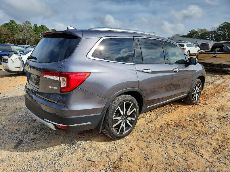 Photo 3 from auction – 2021 HONDA PILOT TOUR with VIN 5FNYF5H62MB035637
