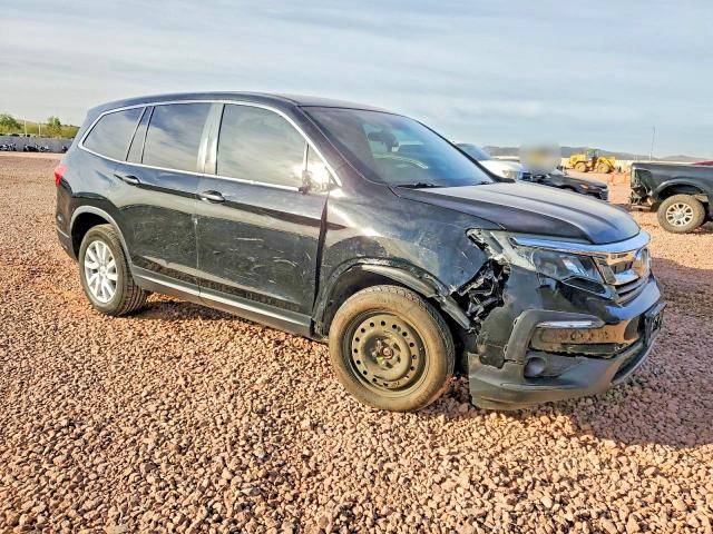 Photo 4 from auction – 2020 HONDA PILOT LX with VIN 5FNYF5H1XLB019284