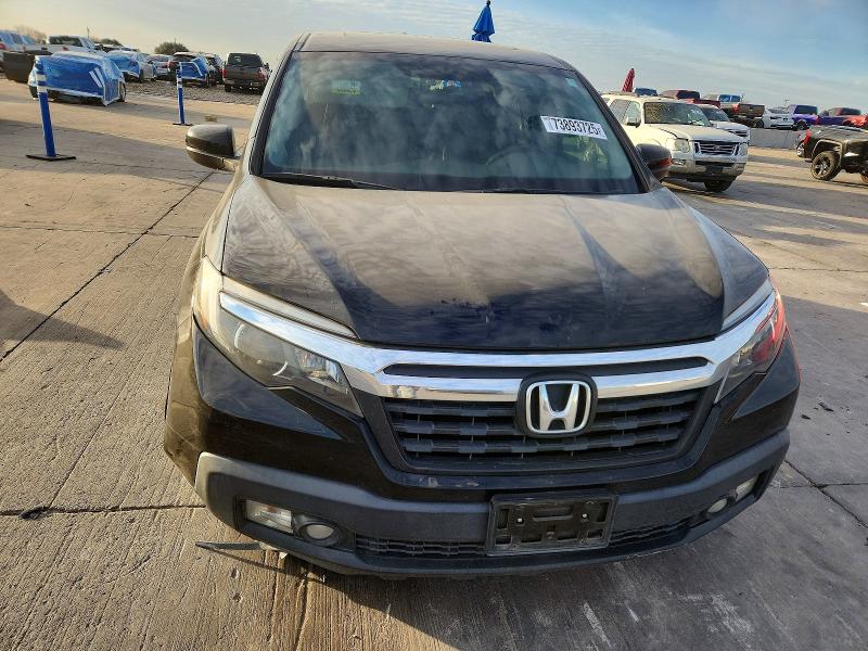 Photo 5 from auction – 2019 HONDA RIDGELINE with VIN 5FPYK2F57KB007373